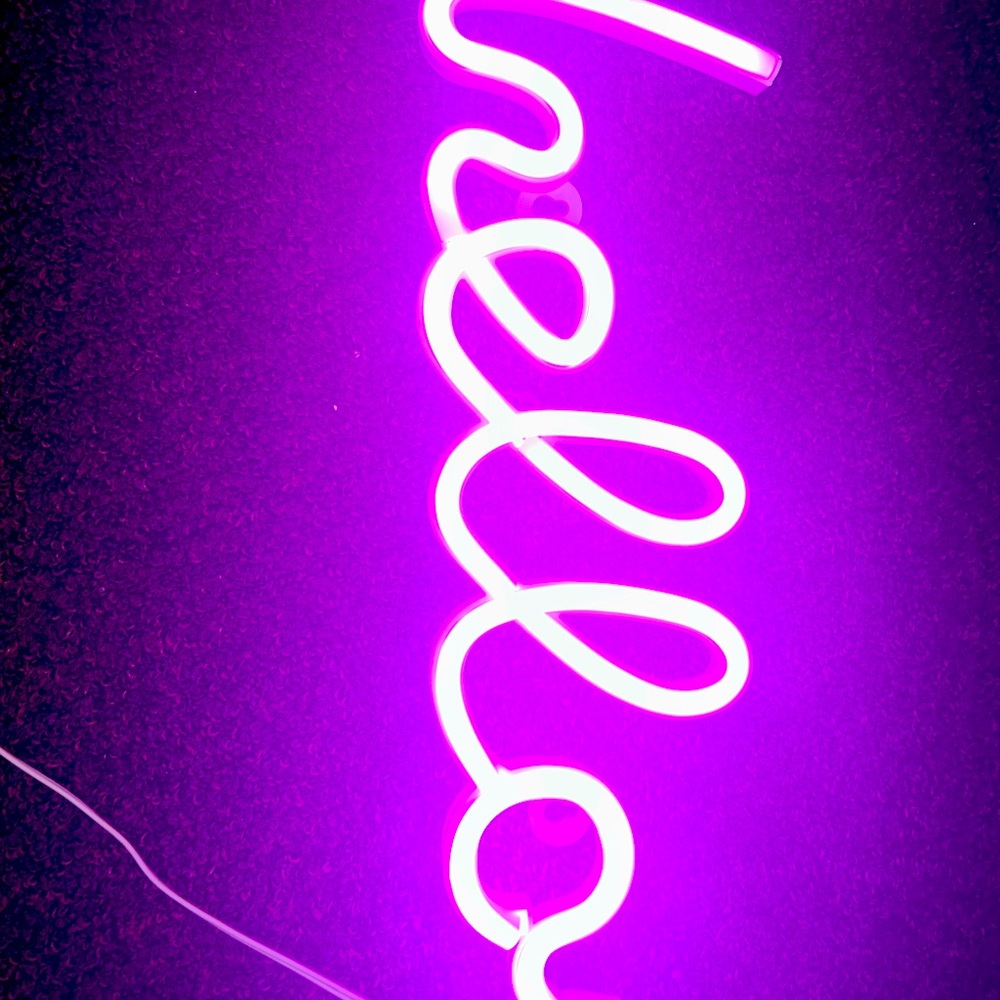 Neon pink light up wall sign